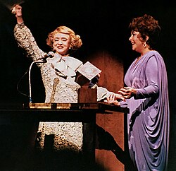 Davis (left) and Elizabeth Taylor in late 1981 during a show celebrating Taylor's life
