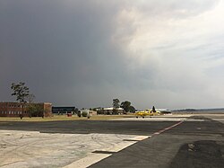 Smoke rises from the Tianjara fire, viewed from HMAS Albatross.