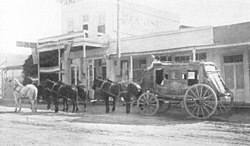 A Kinnear Express stagecoach operating from Tombstone to Bisbee in the 1880s. This thorough-brace stagecoach used thick leather straps to support the body of the carriage and serve as shock-absorbing springs.