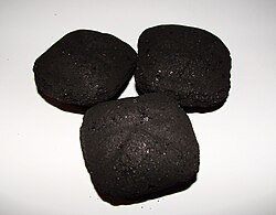 The tendency of charcoal to cake is exploited in producing briquettes, which are more conveniently handled than loose charcoal.