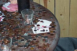 Display in Deadwood, South Dakota with the dead man's hand (here given as A♠ A♣ 8♠ 8♣ 9♦)