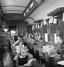 1950 Canadian School Train. Pupils attend classes at Nemegos near Chapleau, Ontario.