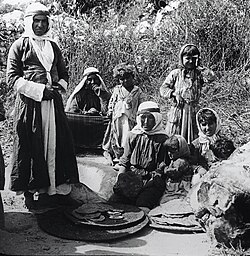 Palestinian Druze family making bread 1920