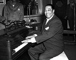 Ellington poses with his piano at the KFG Radio Studio on November 3, 1954