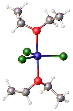 Structure of FeCl3(diethylether)2. Color code: Cl=green, Fe = blue, O = red.