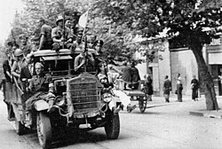 Italy, 1943. Italian partisans celebrating the liberation of Naples