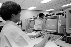 A person doing data entry on a Unisys system in 1989