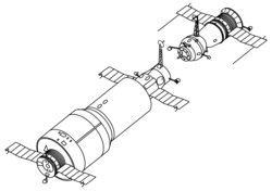 Salyut 1, first crewed space station, with docked Soyuz spacecraft