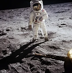 Apollo 11 astronaut Buzz Aldrin walking on the surface of the Moon, which consists of lunar regolith (photographed by Neil Armstrong, July 1969).