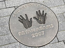 Adams' handprints at Wembley Square of Fame