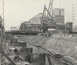 Construction of Museum station, now Melbourne Central, under La Trobe Street in 1974, with the library visible in the background
