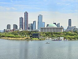 Panoramic view of Yeouido and the National Assembly building from Dangsan Railway Bridge.