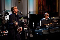 Paul McCartney and Stevie Wonder perform "Ebony and Ivory" at a concert at the White House in 2010