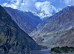 Gorge cut by the Indus River into bedrock, Nanga Parbat region, Pakistan. This is the deepest river canyon in the world. Nanga Parbat itself, the world's 9th highest mountain, is seen in the background.