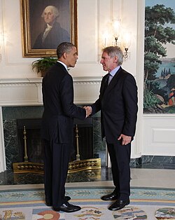 President Barack Obama greets Ford in the Diplomatic Reception Room, April 2, 2013.