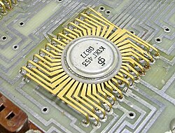 A Soviet MSI nMOS chip made in 1977, part of a four-chip calculator set designed in 1970[78]