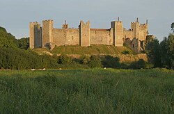 Framlingham Castle in Sheeran's home town of Framlingham, Suffolk. The castle and his upbringing in the town is the subject of his 2017 single "Castle on the Hill".[7]