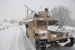 Convoy of U.S. forces passing by in Kapisa Province.