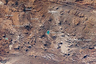 Photo from space: There are numerous volcanoes in the otherwise uniformly desertish landscape.
