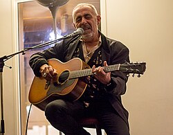 Early guitarist Henry Padovani performing in 2016