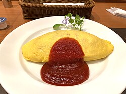 Omurice served with tomato ketchup