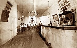 Inside the Long Branch Saloon in Dodge City, Kansas, c. 1870–1885
