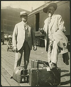 Cody (right) standing with Harry Heye Tammen (left) at the Kansas City Rail Depot, 1913