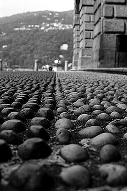 Italian cobblestone-covered street in Isolabella. Cobblestones such as these are designed for horses to get a good grip.