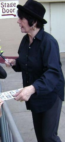 Worley signing autographs at a Wicked performance