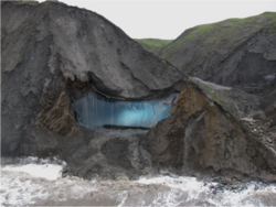 Cross-section showing massive buried ground ice (blue) within permafrost.