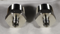 The fitting on the left has not been passivated, the fitting on the right has been passivated.