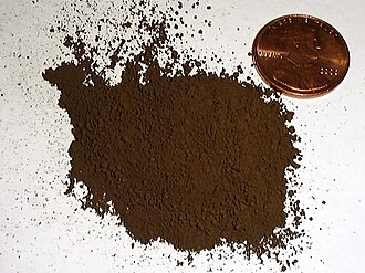 Iron oxide pigment. The brown color indicates that iron is at the oxidation state +3.