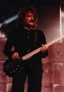 Geezer Butler performing with Black Sabbath in 1995