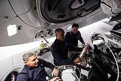 NASA astronauts inside the Dragon spacecraft during the Crew-1 mission rendezvous with the International Space Station