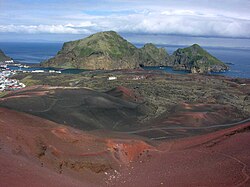 Heimaklettur seen from the top of Eldfell Volcano, which erupted on 23 January 1973