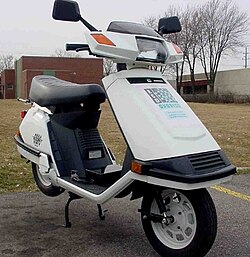 A scooter modified to use hydrogen as fuel within its internal combustion engine