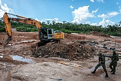 Agents from IBAMA, Brazil's environmental police, searching for illegal logging activity in Indigenous territory in the Amazon rainforest, 2018