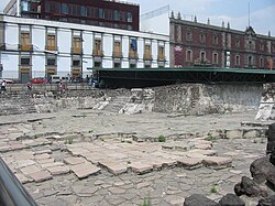 View of ruins of the "Eagle" building of the Templo Mayor complex. The roof is there to protect the remains of paintings that are inside.