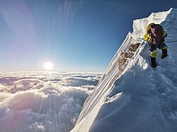 Climber approaching the summit of Manaslu at 8,163 metres