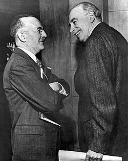 Harry Dexter White (left) and John Maynard Keynes, the "founding fathers" of both the World Bank and the International Monetary Fund (IMF)[13]