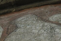 Mica flakes embedded in a fresco for glitter