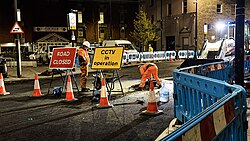 Globe Lane being resurfaced by workers in Chatham, Kent, England