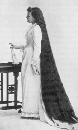 Harper's own hair was the greatest advertisement for her products and services. This iconic image, and others in a similar pose, appeared in much of her early advertising.