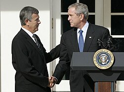 Johanns shakes hands with President George W. Bush, 2007