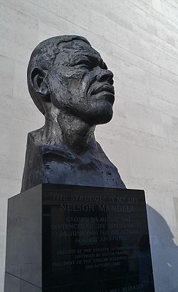 Bust of Nelson Mandela erected on London's South Bank. Mandela is widely considered a global hero for his role in opposing the apartheid system and inaugurating a multiracial democracy.[275][276][277]