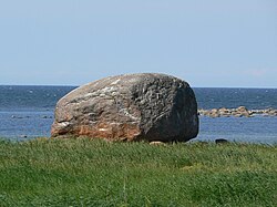 Glacial erratic Ehalkivi, with overground volume of 930 cubic metres (1,220 yd3) (weight approximately 2,500 metric tons or 2,800 short tons), in Estonia
