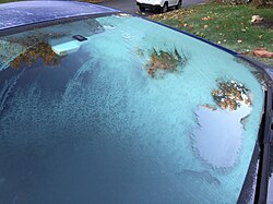 Ice formation on exterior of vehicle windshield