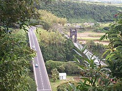 The two bridges over the Rivière de l'Est linking Saint-Benoît to Sainte-Rose (only the left bridge is still in use)