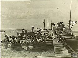 A landing party from the German Navy cruiser Emden leaves the Cocos (Keeling) Islands via this jetty on Direction Island on 9 November 1914.