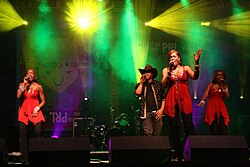 Boney M. featuring Maizie Williams performing at a concert